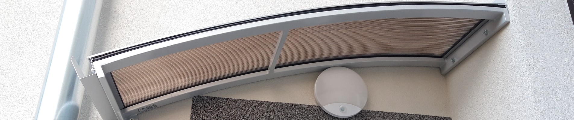 Daszki i zadaszenia nad drzwi wejściowe